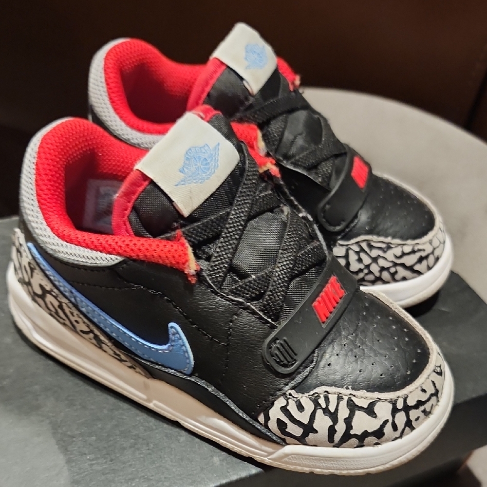 Nike Kids Black, Red, and Blue Sneakers